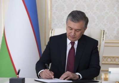 Президент Марказий банкка оид қонунни имзолади фото